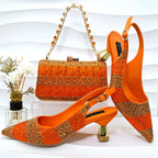 New Italian Design Stylish And Elegant Sky Blue Rhinestone Embellished Satin Pointy Toe Pumps And Clutch Bag